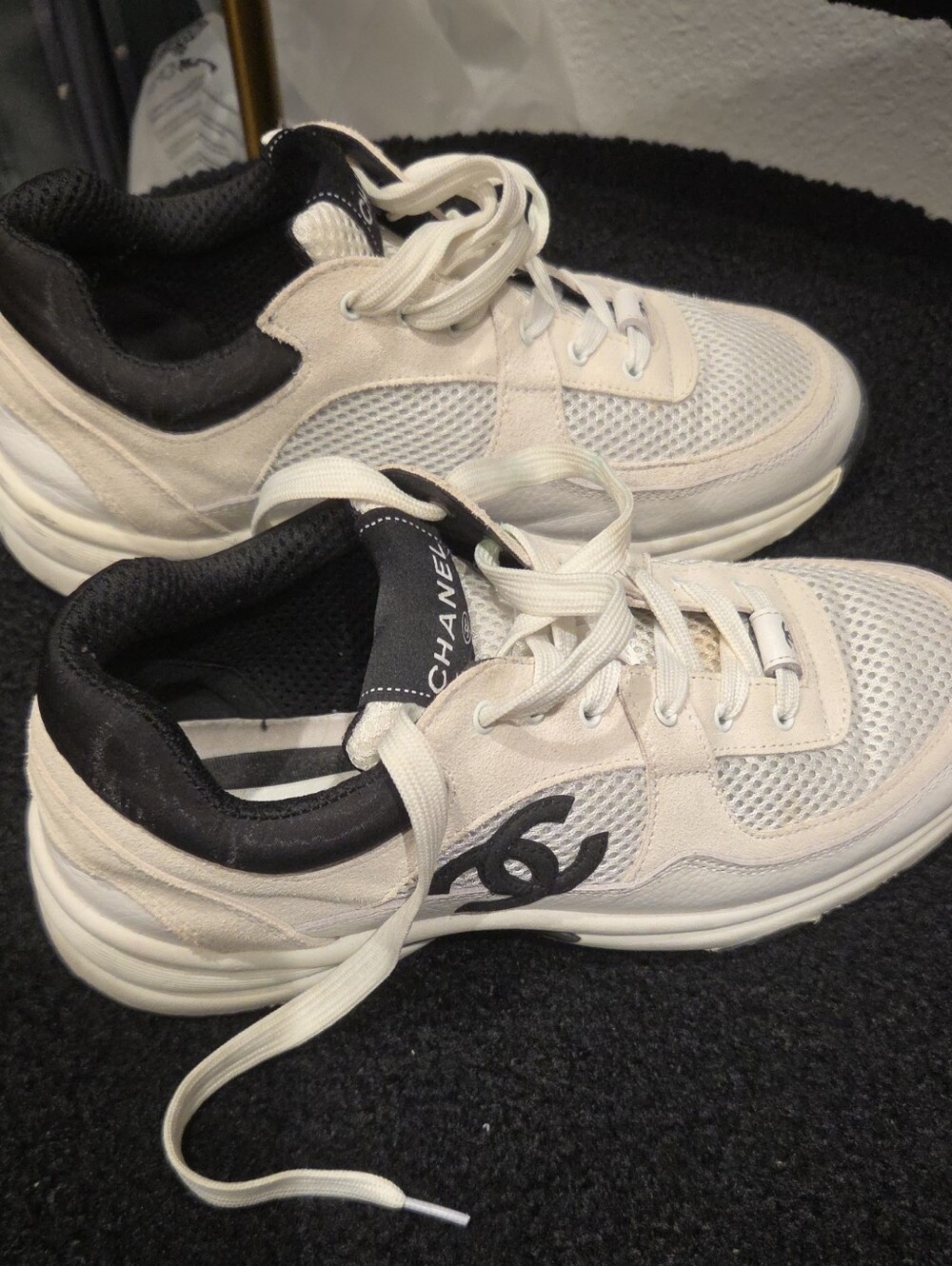 CHANEL Cream and Black Logo Runner Sneakers